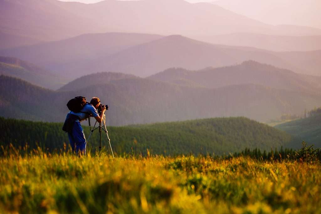 professional photographer in the mountains 2021 08 29 03 56 32 utc